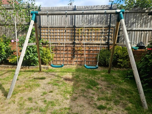 Plum wooden double swing set
